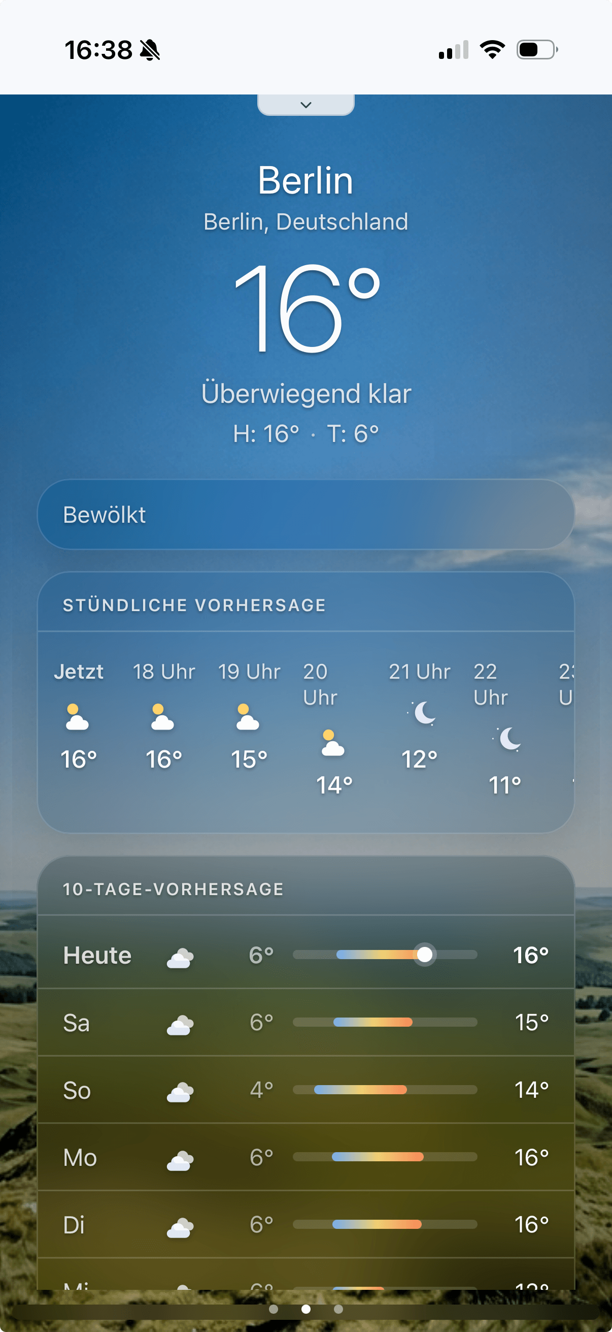 Mindoo Weather on iPhone showing a responsive weather tile with forecast cards and glassmorphism styling