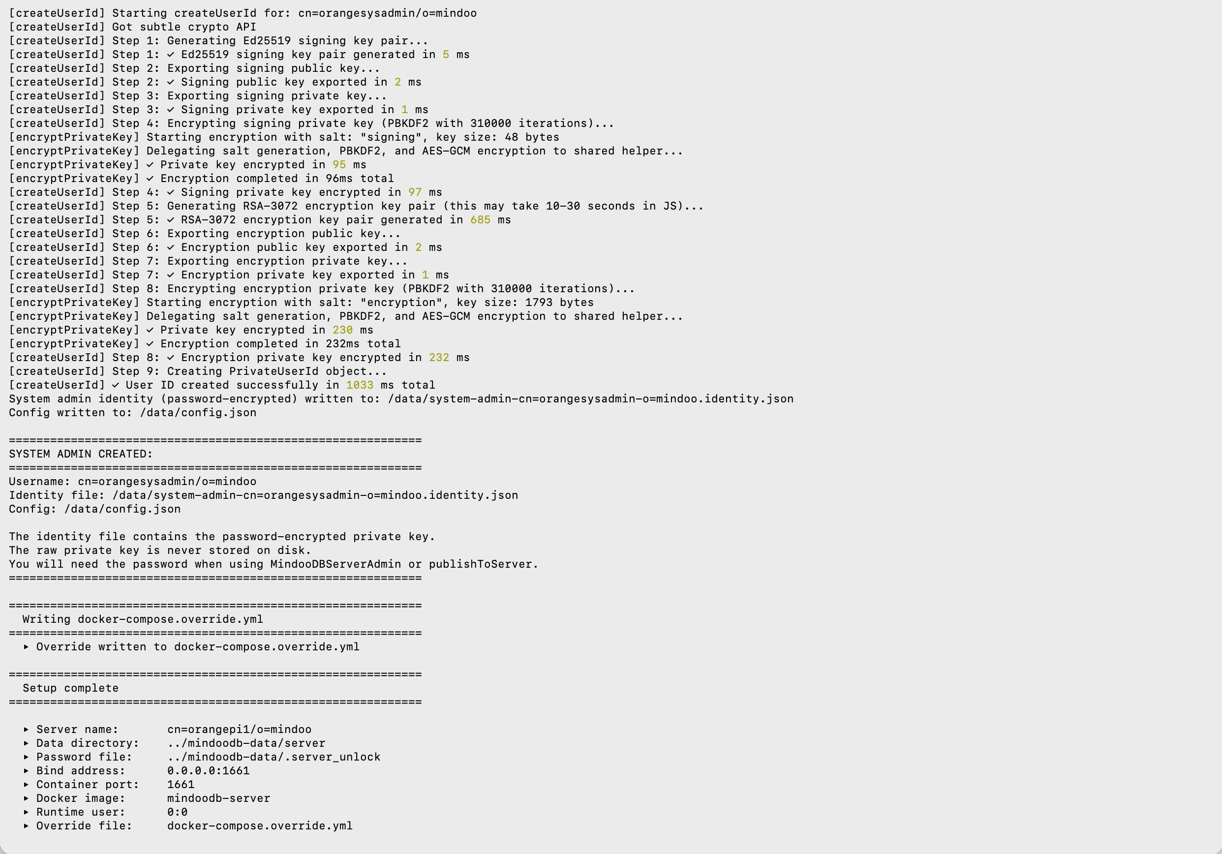 The system admin creation log: a second identity for cn=orangesysadmin/o=mindoo generated in 1033 ms, the identity file written password-encrypted to /data, the note that the raw private key is never stored on disk, the docker-compose.override.yml being written, and the "Setup complete" summary listing server name, data directory, password file, bind address and container port